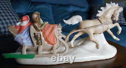 Hugh ceramic horse and sleigh, four people and dog (used to be music box)