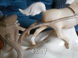 Hugh ceramic horse and sleigh, four people and dog (used to be music box)