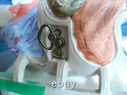 Hugh ceramic horse and sleigh, four people and dog (used to be music box)