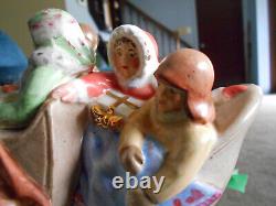 Hugh ceramic horse and sleigh, four people and dog (used to be music box)