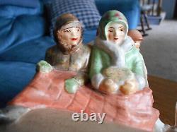 Hugh ceramic horse and sleigh, four people and dog (used to be music box)