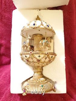 San Francisco Music Box Co Jeweled Egg Musical Carousel Egg Camelot 11 tall